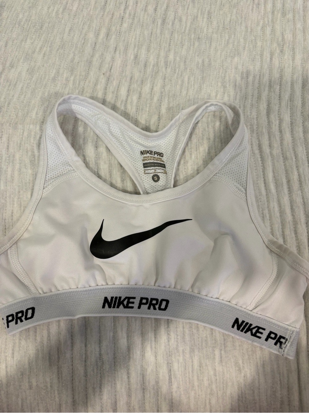 Nike White Sports Bra with Black Swoosh and Branded Band